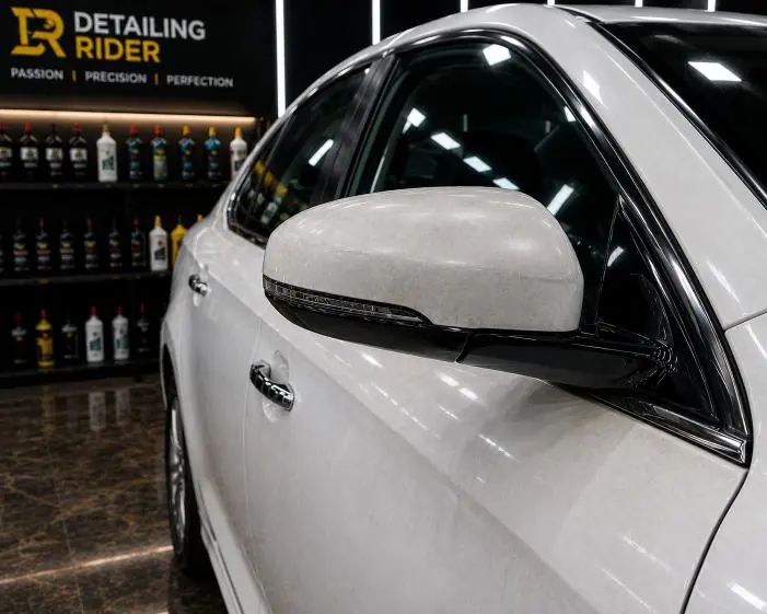 White car with deep gloss after paint correction